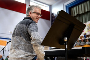 Mr. Piper in his element on the piano