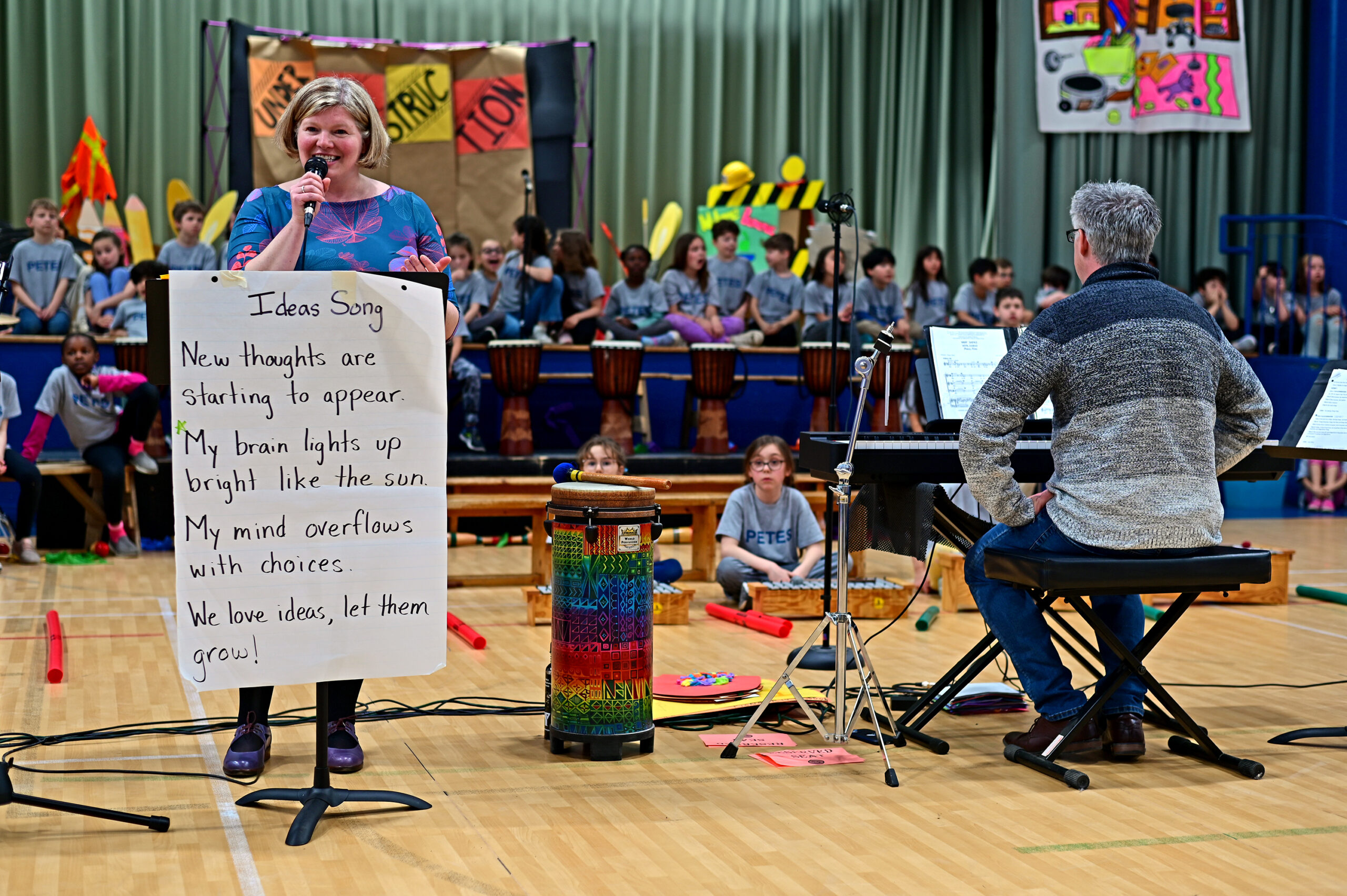 Ms. Medley and Mr. Piper lead the performance
