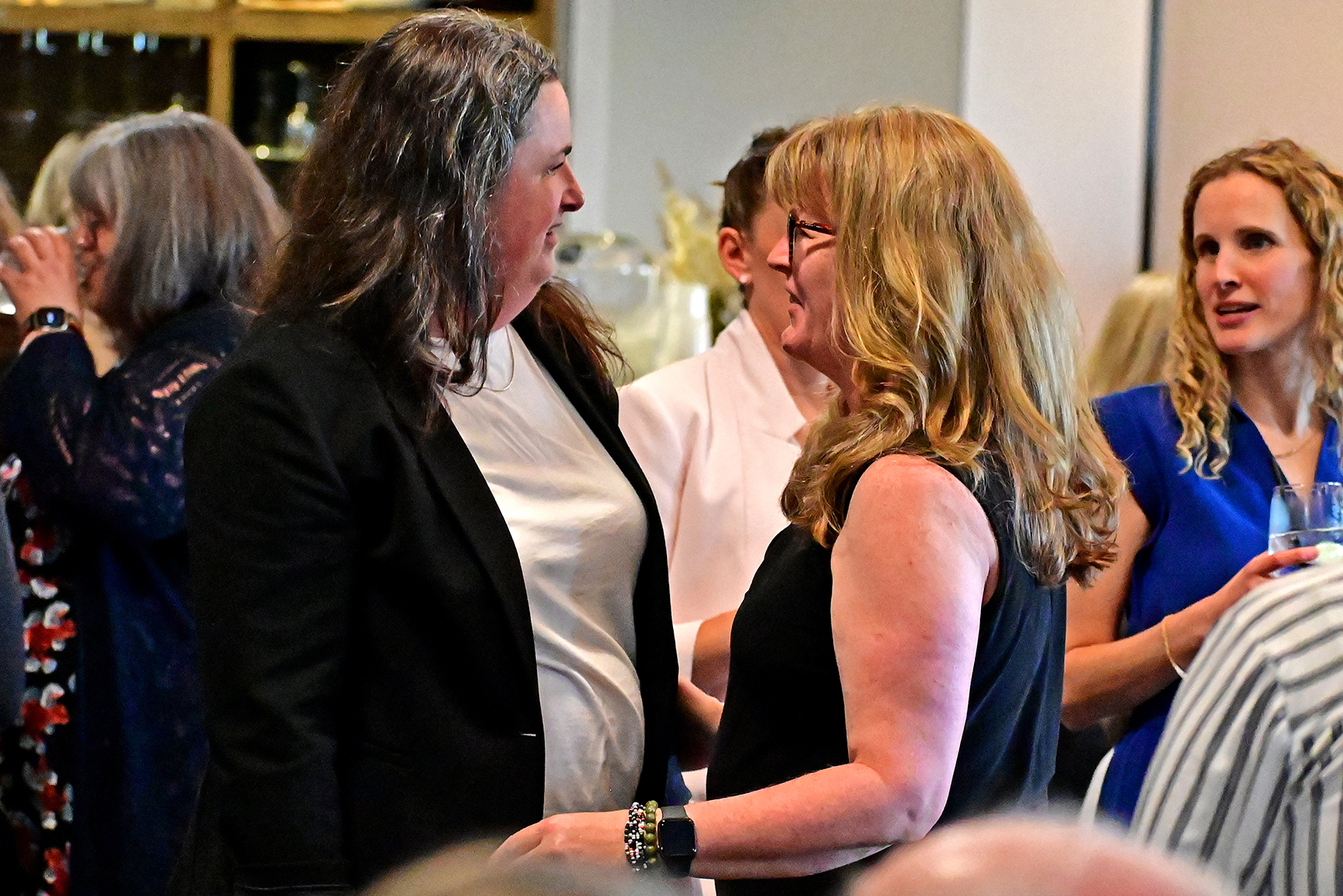 WQSB staff members from across the board catch up before dinner and the awards