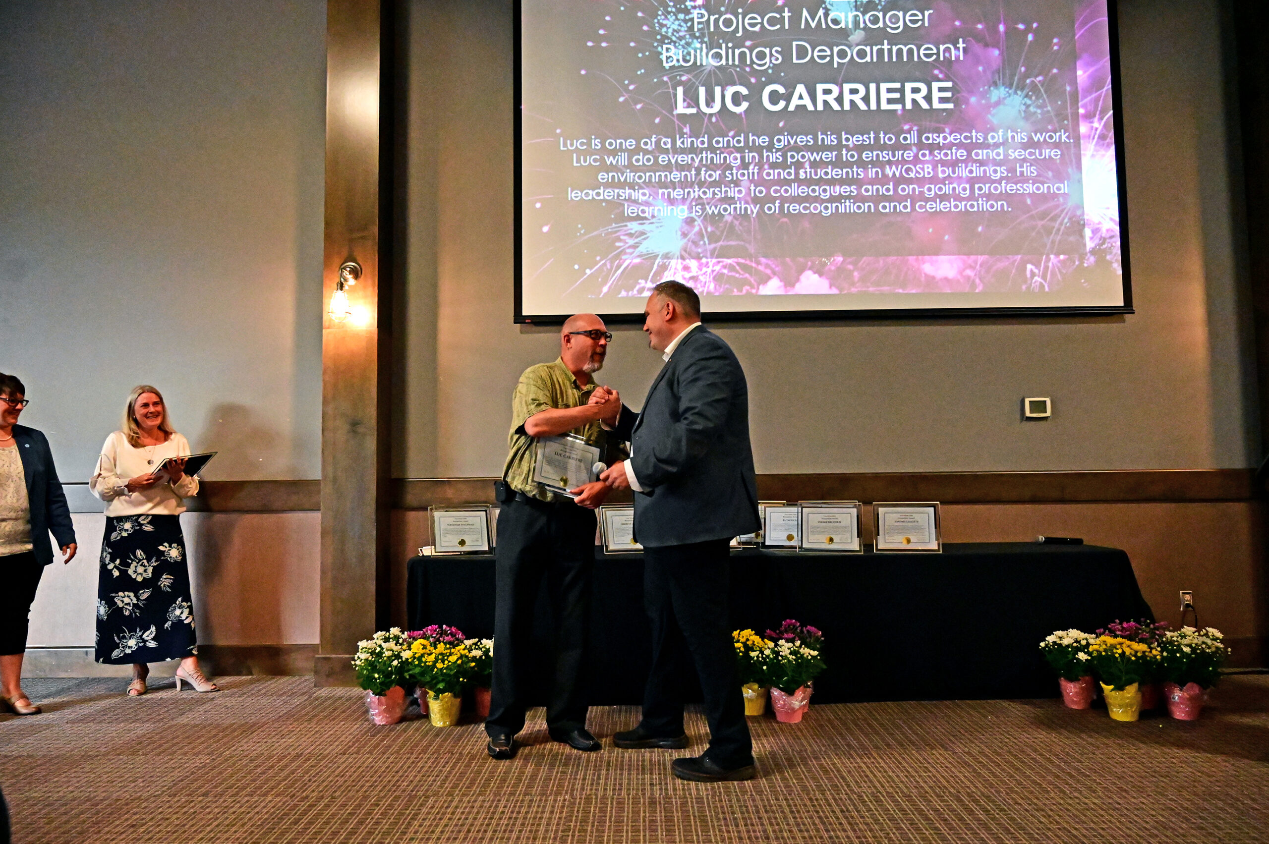 Winners accepting their awards